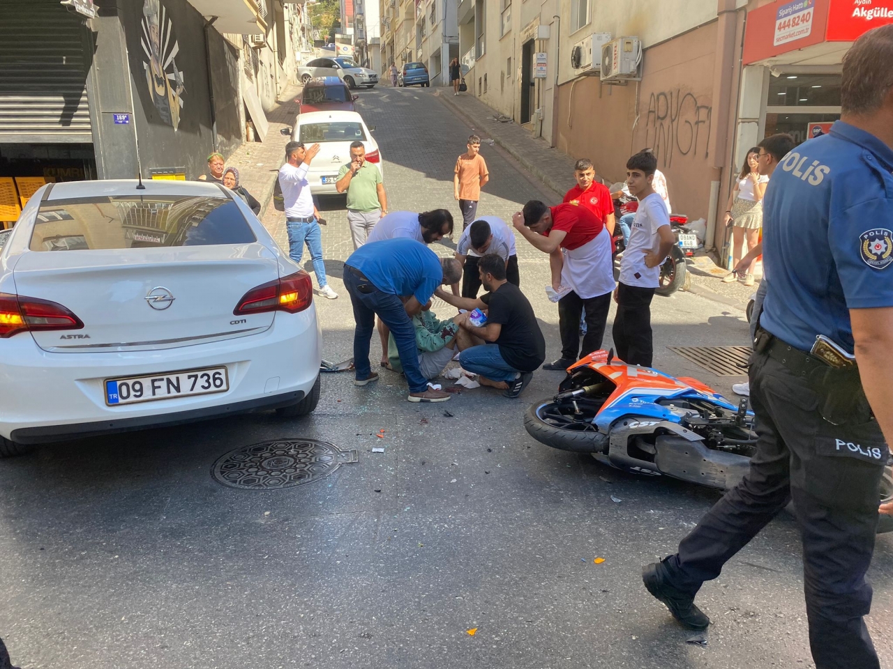 Efeler'de otomobille çarpışan motosikletin sürücüsü yaralandı