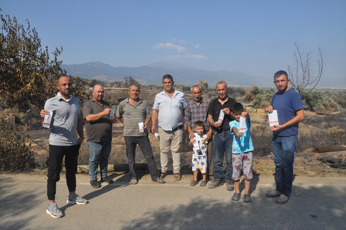 İzmir'de yangından etkilenen mahallede su sayaçlarının okunmasına tepki