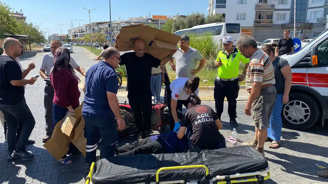 Aydın'da kazada yaralanan kadın ambulans gelene kadar kartonla güneşten korundu